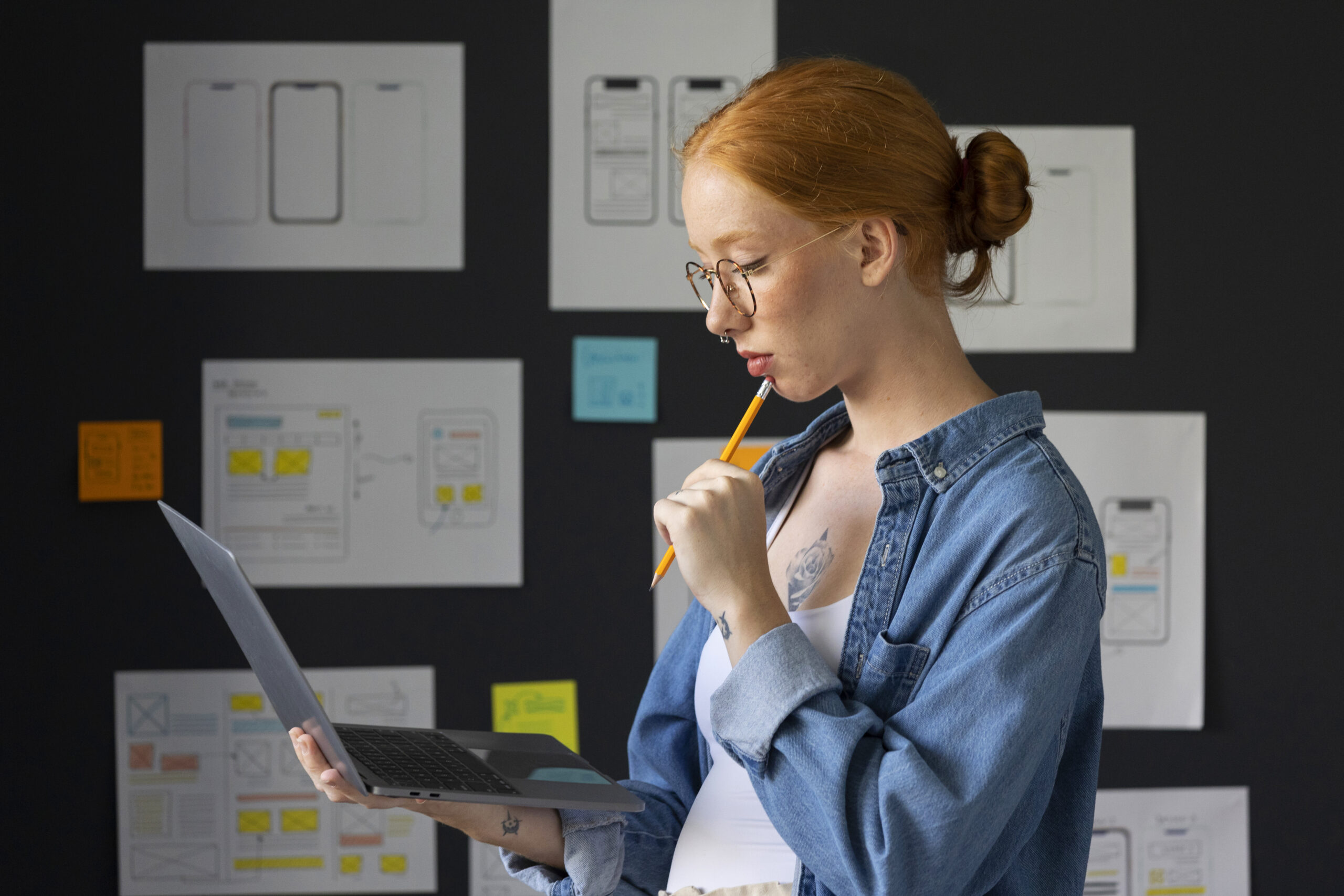 female web designer office with laptop